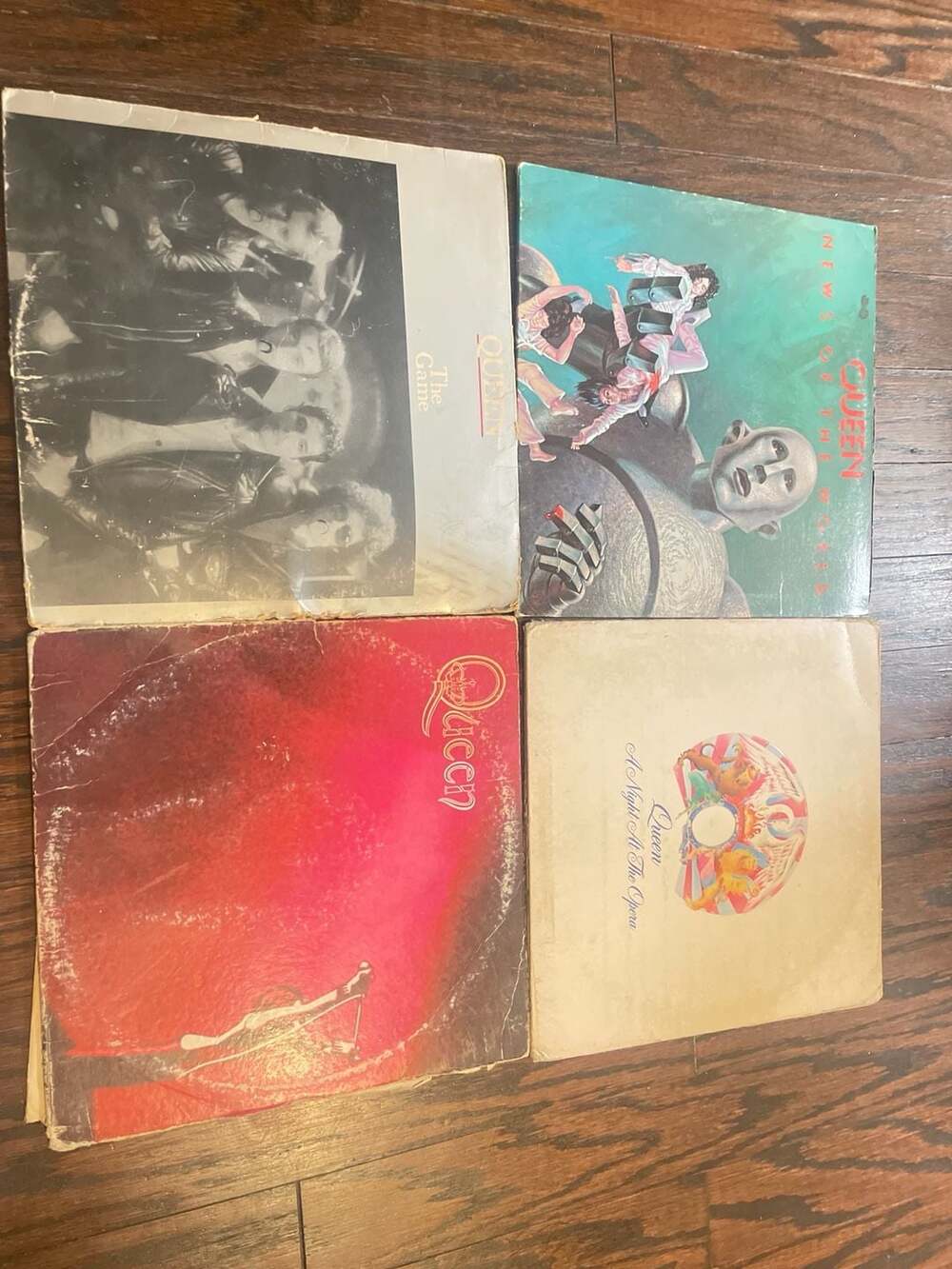 Lot of 4 Queen Vinyl Records: The Game, News of the World, A Night At The Opera,